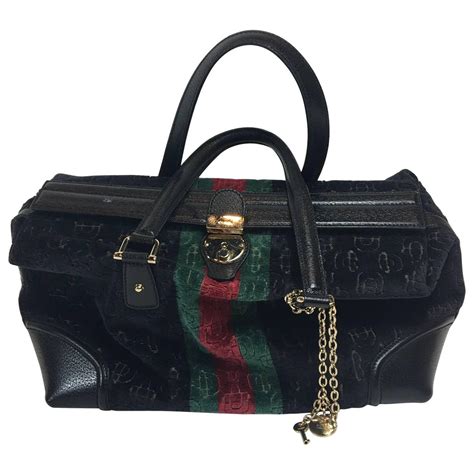 gucci black velvet handbag.